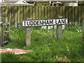 TM1850 : Tuddenham Lane sign on Tuddenham Lane by Geographer