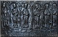 Ashover: All Saints Church: The rare Norman lead font; apostles holding books