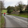 SO8700 : Cycling down Woefuldane Bottom near Minchinhampton by Jaggery
