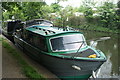 View of a narrowboat moored on the Grand Union Canal near Batchworth Lock