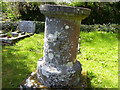 St Issells Church and grave with crest, Saundersfoot