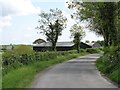 Farm sheds on a bend in the Magheratimpany Road