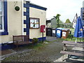 Elizabeth II postbox outside the Hope & Anchor public house, Port Carlisle