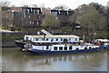 Boats moored by Kew Bridge