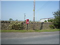 NZ1743 : Elizabeth II postbox, Wilk's Hill by JThomas