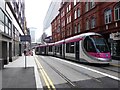 Midland Metro tram No. 36 using a crossover track, Stephenson Street, Birmingham