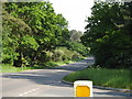 TL8586 : A134 Mundford Road & Rugby Club sign by Geographer