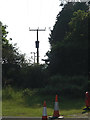 TL8586 : Electricity Line & Poles at Thetford Rugby Club by Geographer