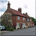 SK7452 : Rolleston: cottages in Station Road by John Sutton