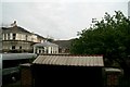 Corrugated roof on bus shelter and W.I.P. at Rustington Hall