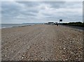 TQ6906 : Shingle beach with parking by Peter Holmes