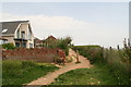 Clifftop path and a wall with character in Peacehaven