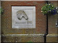 TL8881 : The Nunnery Stud sign by Geographer