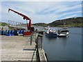 NF7909 : Jetty and boats at Acairseid by M J Richardson
