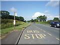 NY3451 : Bus stop on the A595, Nealhouse by JThomas