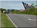 The A458 passing a Vote Leave hoarding