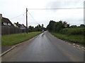 TL9585 : Entering Bridgham on The Street by Geographer
