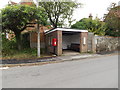 TL9585 : West End Postbox & Bus Shelter by Geographer