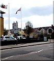 Gnoll Park Road directions sign and flagpoles, Neath