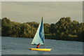 TQ4590 : View of a sailing boat on the lake in Fairlop Waters #13 by Robert Lamb