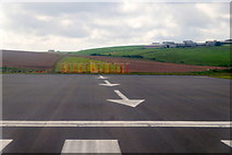 HY4708 : West end of the main runway at Kirkwall Airport by Mike Pennington