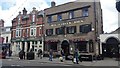 Golden Lion Pub next to Lloyds Bank