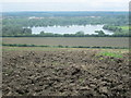 Holyfield Lake beyond a ploughed field