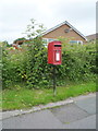 Elizabeth II postbox on Higham Hall Road