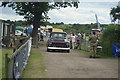 TQ5583 : View of a Chevrolet GMC pick up truck leaving Havering Mind's Wings and Wheels event in Damyns Hall Aerodrome by Robert Lamb