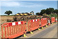 Barrier beside the lane leading up Bullock Hill