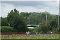 View of a Virgin East Coast HST flying past Hitchin Lavender