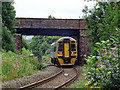 An Aberystwyth bound train passes the site of Meole Brace station