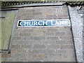 TF2410 : Church Lane sign by Geographer