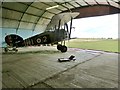 TL8100 : WW1 replica Biplane at Stow Maries Air Museum by Derek Voller