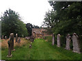 SE2740 : St John the Baptist, Adel - churchyard by Stephen Craven