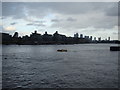 View of buildings in Wapping and Canary Wharf from the South Bank