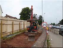 SX9489 : Preparing for construction work, Bridge Road, Countess Wear by David Smith