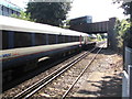 Bus on, and train under, Wide Lane Bridge, Southampton