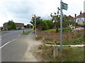 Footpath emerges at bus stop at the top of Overhill