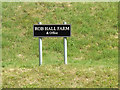 TM0570 : Rob Hall Farm sign by Geographer