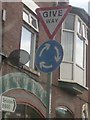 UK Give Way Sign And Mini Roundabout Sign