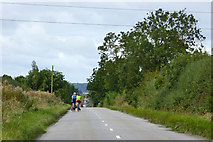 SP9159 : Cycling on Harrold Road by Robin Webster