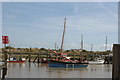 View of a boat sailing along the Rother from Rye Harbour