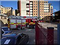 A fire engine over the fence