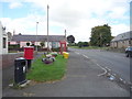 Elizabethan postbox and telephone box on the A698, Cornhill on Tweed