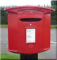 Close up, Elizabethan postbox on the A698, Cornhill on Tweed