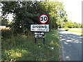 TM1484 : Gissing Village Name sign on Burston Road by Geographer