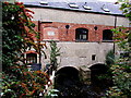 Nailsworth Stream flows under Churches