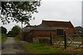 SK3240 : Farmyard buildings at the back of the Kedleston Hotel by Christopher Hilton
