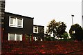 View of houses on Yarmouth Crescent from the River Lea towpath